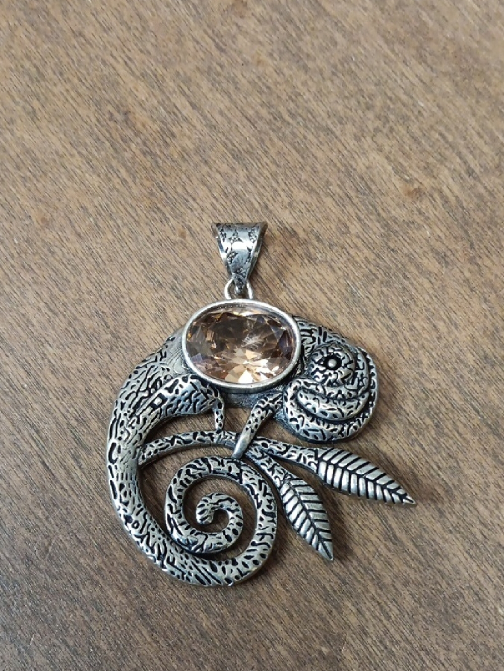 Floral Swirl Cameleon Pendant with Champagne Stone